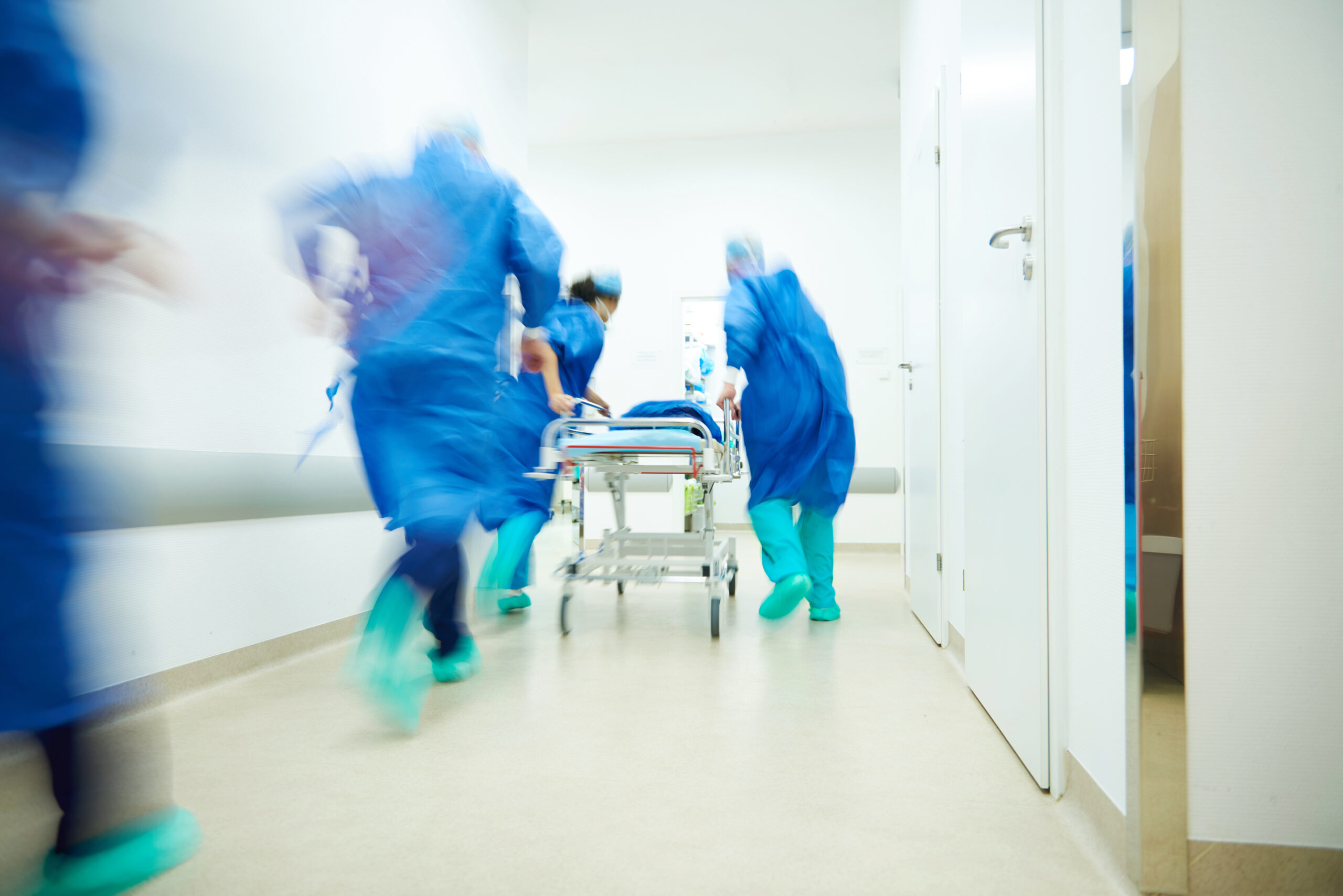 Doctors running for the surgery